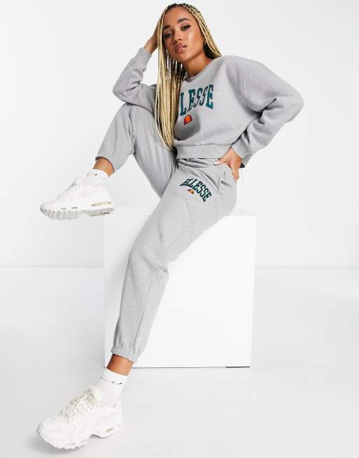 ellesse collegiate trackies with logo in grey