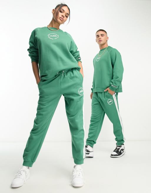 Ellesse community club unisex joggers in green | ASOS