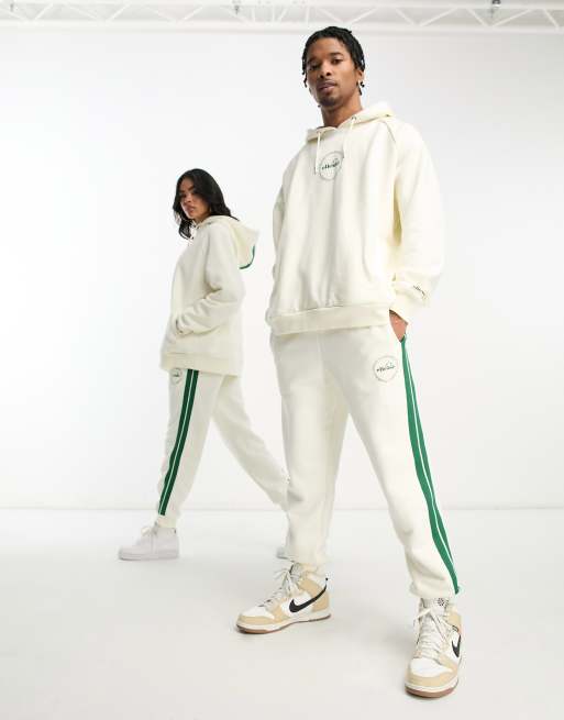 Ellesse community club unisex joggers in off white | ASOS