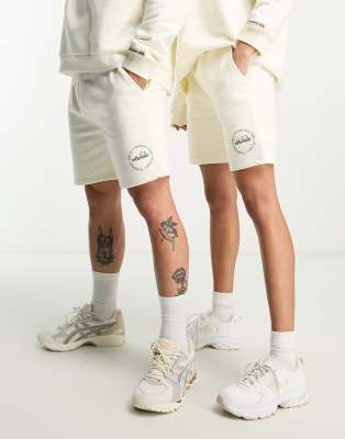 Ellesse community club unisex shorts in off white - ASOS Price Checker