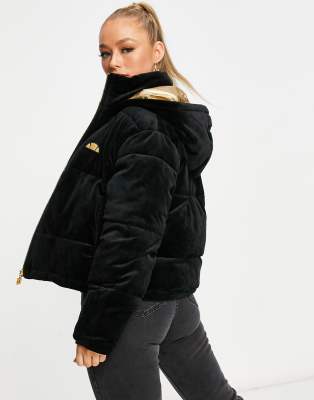ellesse cropped puffer jacket in black