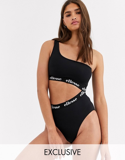 ellesse Exclusive one shoulder cut out swimsuit in black