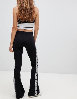 Altijd complexiteit vorm Ellesse Flared Joggers With Side Stripe Logo Taping Co-Ord | ASOS