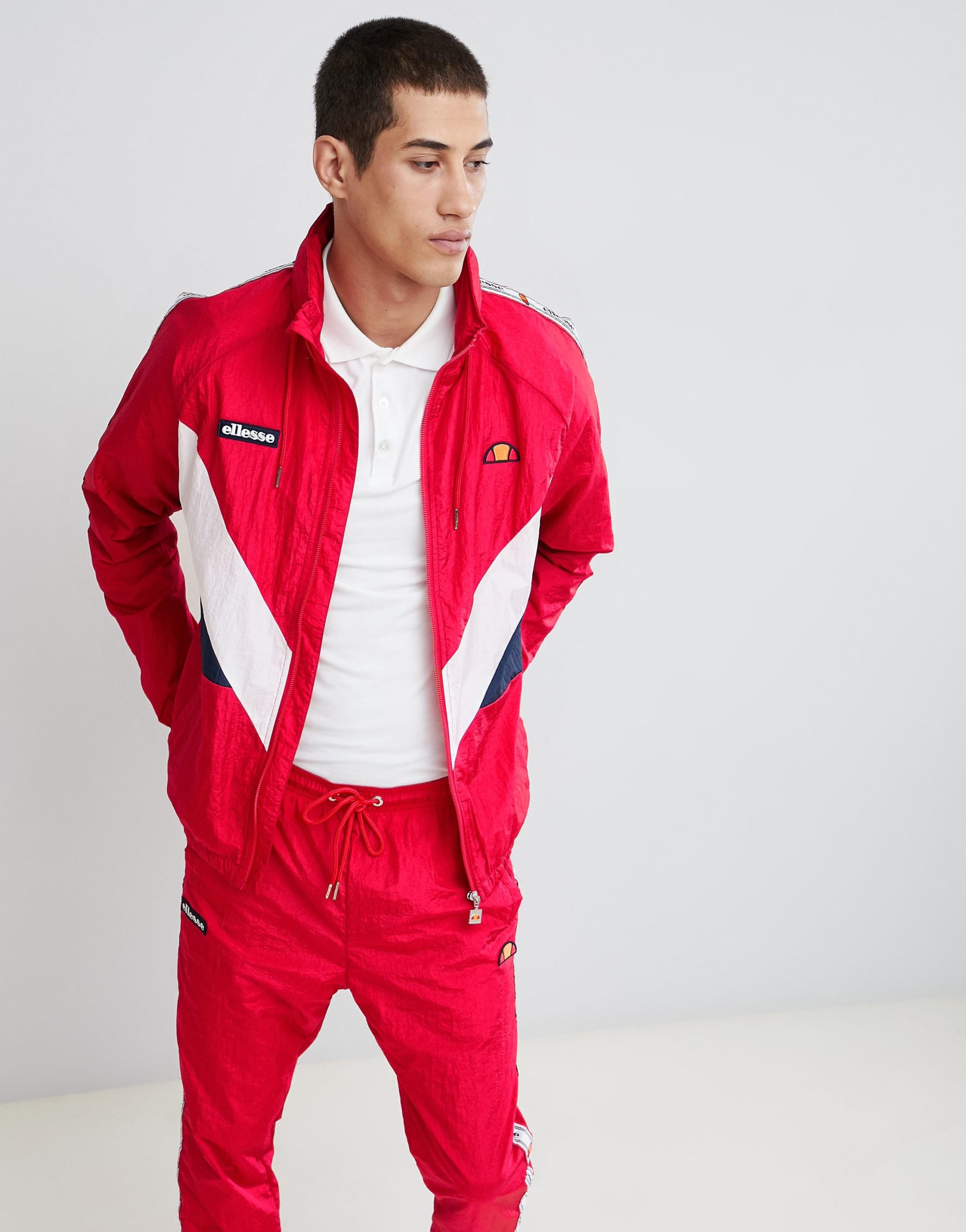 Костюм shell. Спортивный костюм Ellesse мужской. Ветровка Ellesse красная мужская. Ellesse Gerano спортивный костюм мужской. Красная ветровка Ellesse.