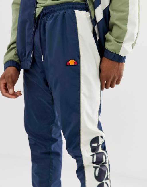 ellesse Gioele recycled woven track pants in navy green exclusive