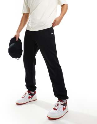 ellesse – Guliana – Jogginghose in Schwarz mit Zierstreifen-Bund - view 1