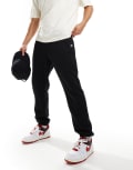 ellesse Guliana tipped waistband trackies in black