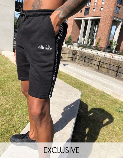 ellesse Harvi fleece shorts with taping in black exclusive at ASOS