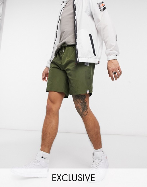 Ellesse high shine shorts in khaki exclusive to ASOS