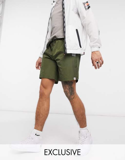 Ellesse high shine shorts in khaki exclusive to ASOS