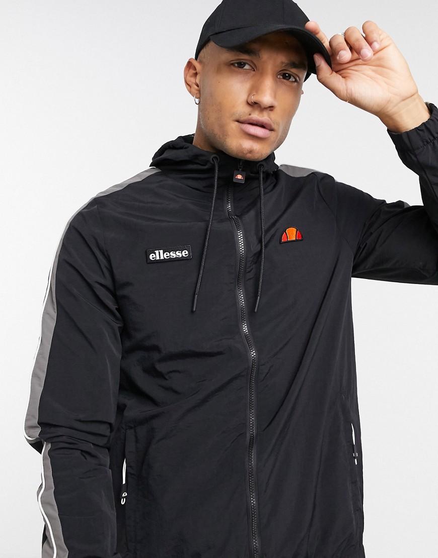 ellesse hooded track jacket with reflective piping in black