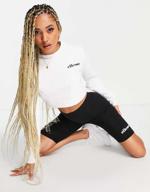 ellesse - Hvidt og sort sæt med cropped trøje og leggingsshorts 