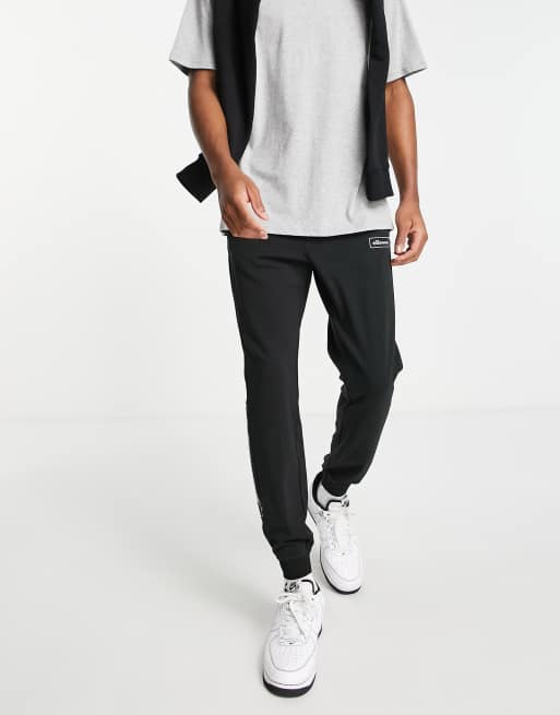 ellesse jogger with reflective panel in black ASOS