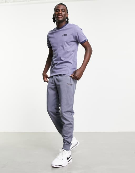 ellesse – Jogginghose in Grau mit farblich abgestimmtem Logo