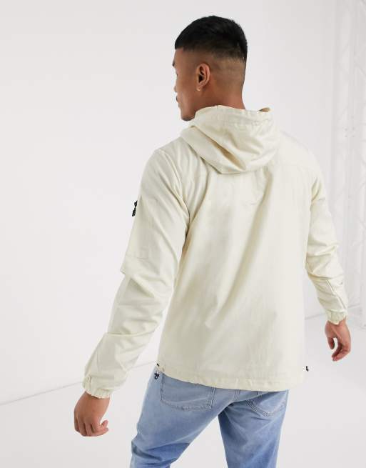 ellesse Joli utility overhead reflective jacket in stone exclusive at ASOS