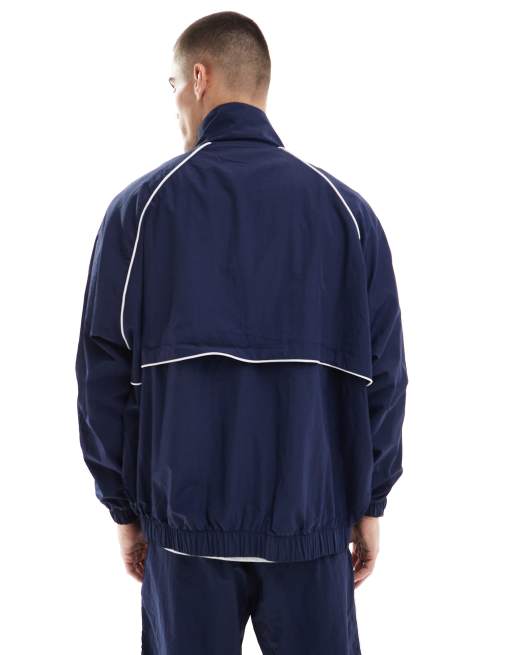 ellesse Kahlochi full zip jacket in navy | ASOS