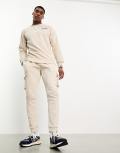 ellesse Labico cargo trackies in stone-Grey