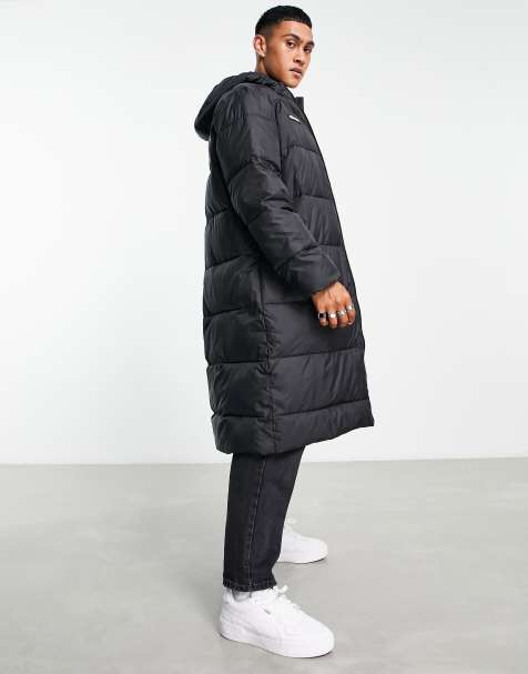 ellesse longline black puffer coat in black - view 1