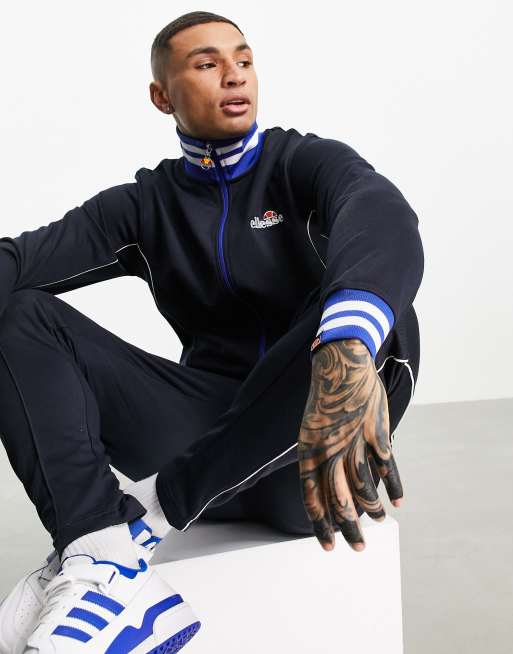 ellesse - Marineblå jakke med logo og gennemgående lynlås