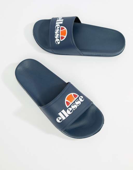 Ellesse – Marineblaue Slider mit großem Logo