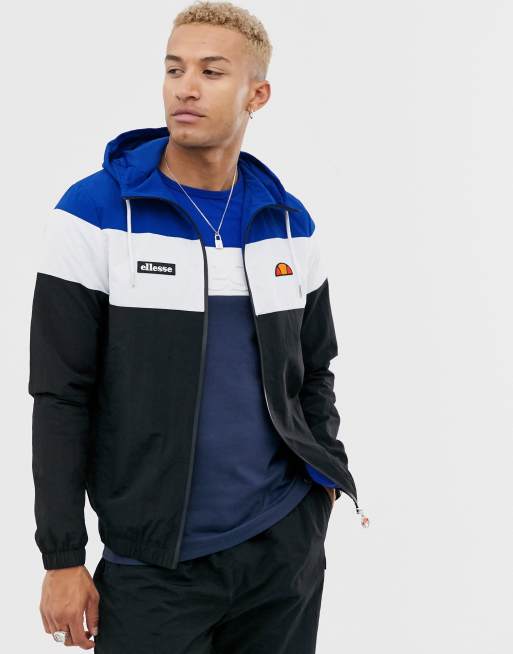 ellesse Bla och svart traningsoverall med fargblock ASOS