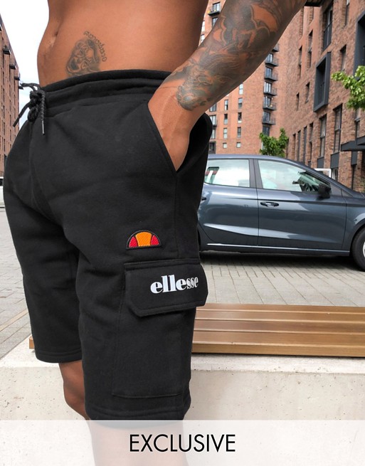 ellesse Naro utility pocket fleece shorts in black exclusive at ASOS