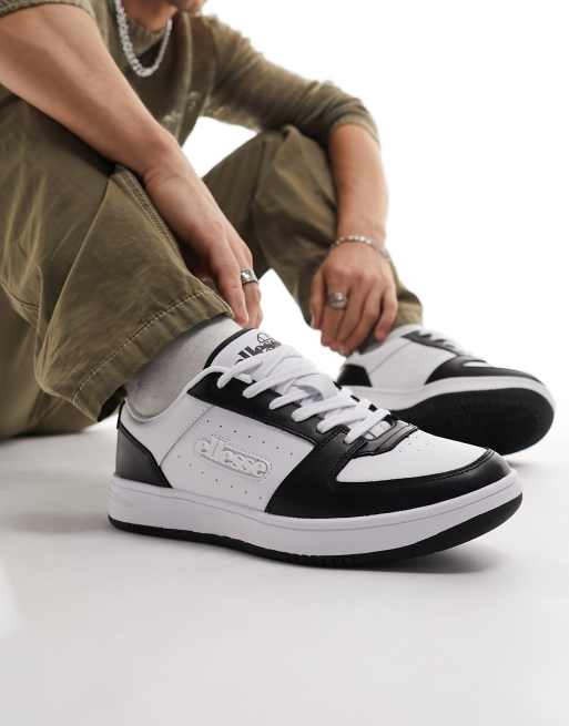 ellesse – Panaro – Vita och svarta sneakers med kupad sula