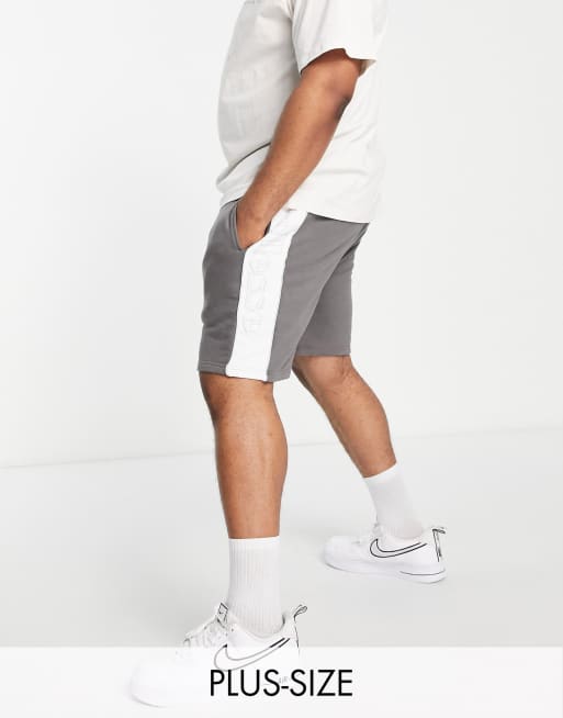 ellesse – PLUSSTORLEK – Grå blockfärgade shorts med logga