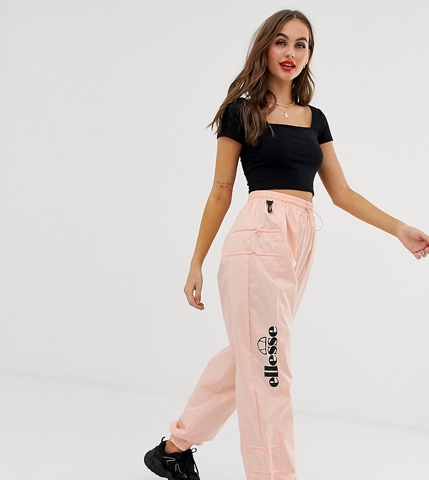 Ellesse recycled tracksuit bottoms with side logo and toggles-Pink
