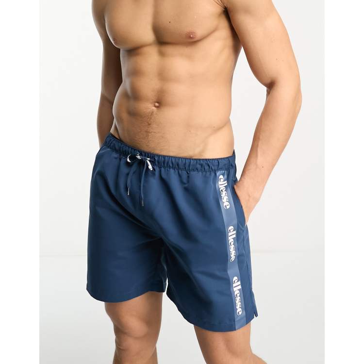 ellesse Scorfano swim shorts with side taping in dark blue ASOS