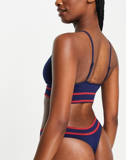 Ellesse seamfree bra and thong set with logo stripe in navy, 2 of 4