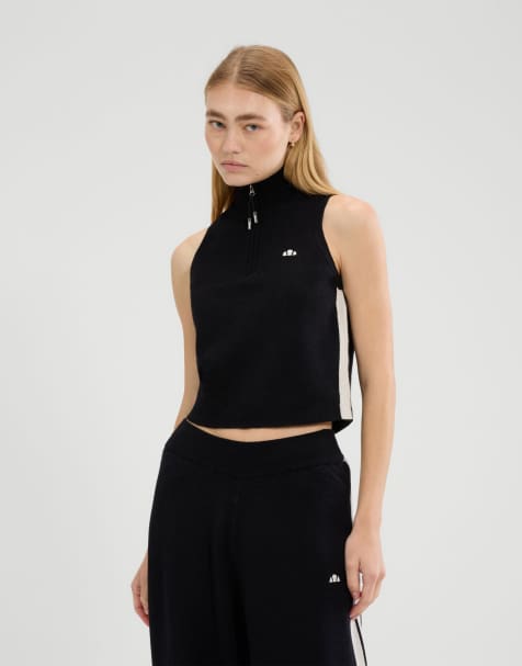 ellesse Surista 1/4 zip top in black - view 1