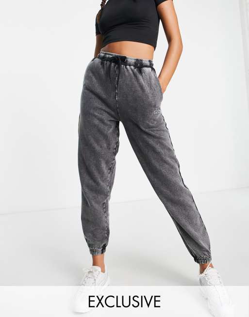 ellesse – Svarta, stentvättade mjukisbyxor, endast hos ASOS