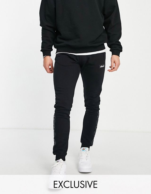 ellesse sweatpants with taping in black exclusive to ASOS