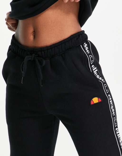 ellesse sweatpants with taping in black