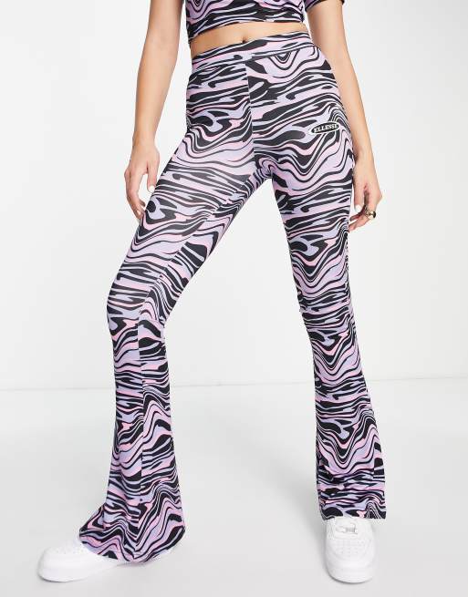 ellesse swirl print flares in purple