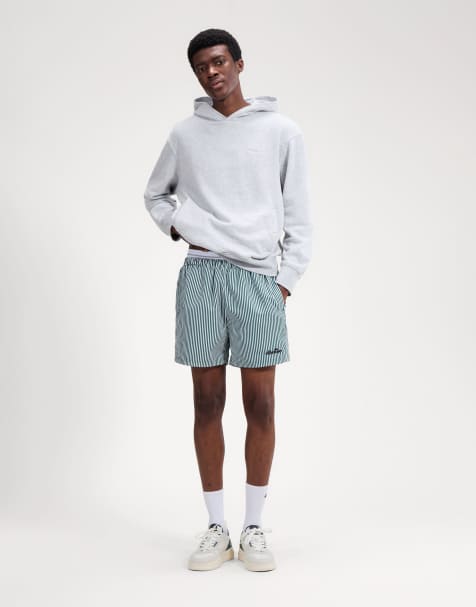 ellesse Sylbio swim short in white/dark green