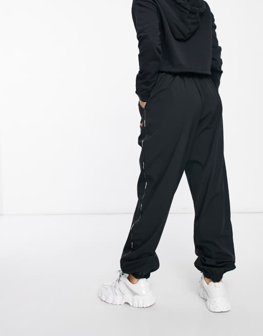 Ellesse tape shop fleece track pants