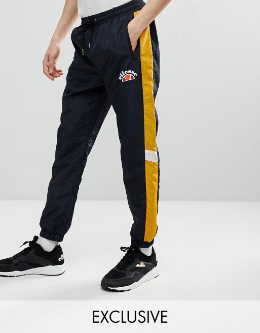 krigsskib jeg er sulten Medicinsk ellesse Tracksuit With Panels In Black | ASOS