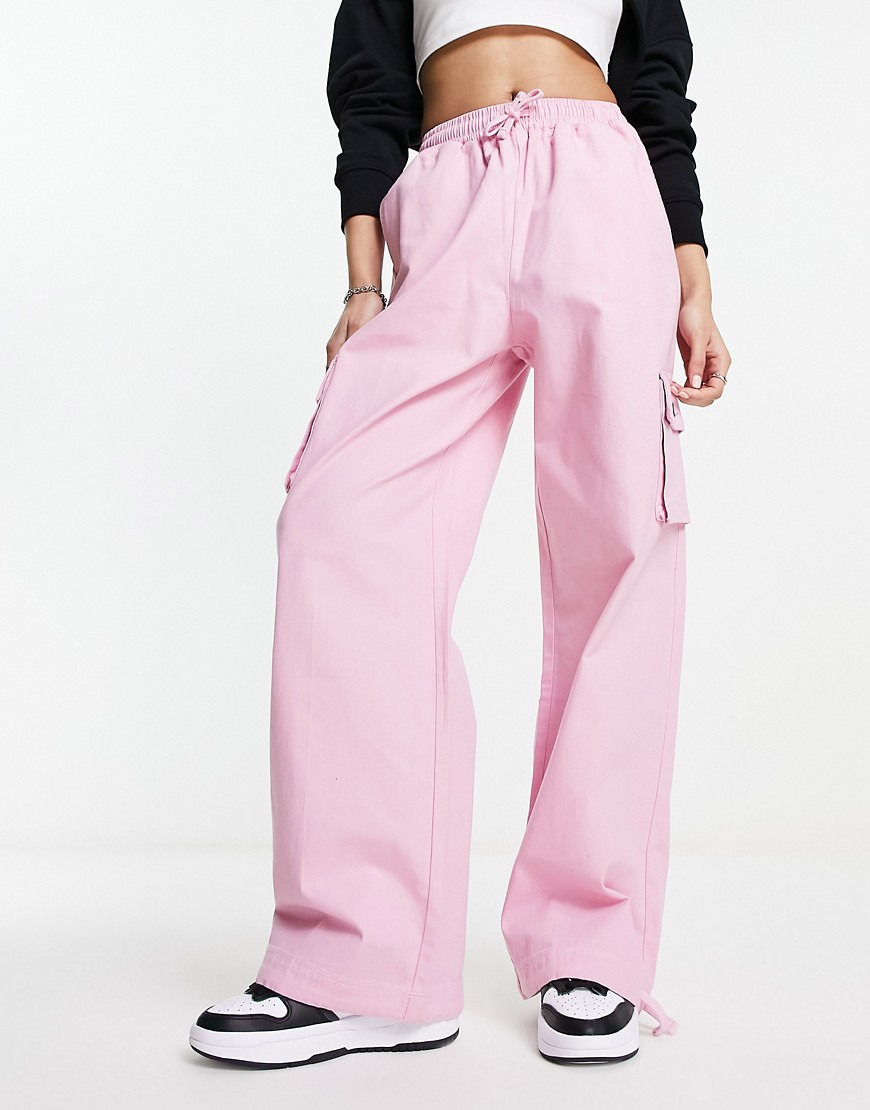 ellesse Trazzal oversized track pants in pink