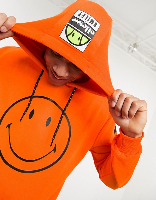 ellesse x Smiley Arceri logo hoodie in neon orange