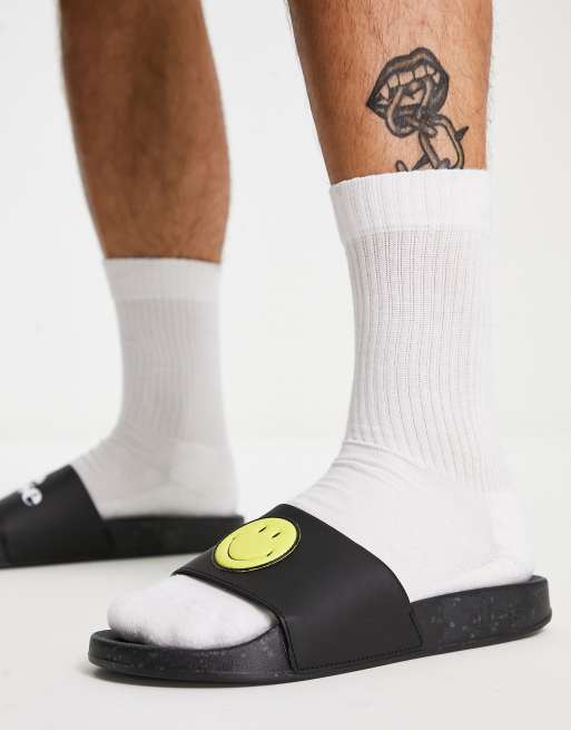 Ellesse x smiley fillipo sliders in black