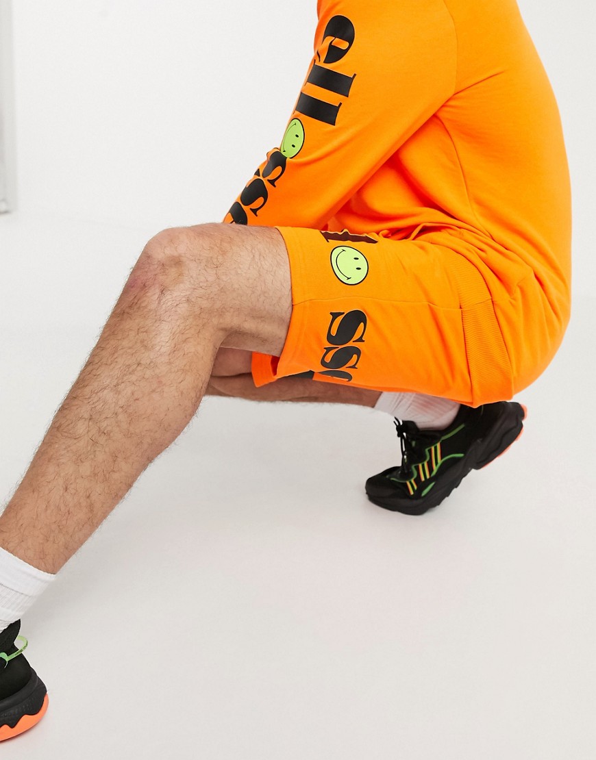 ellesse x Smiley - Tallegro - Neon-orange joggingshorts