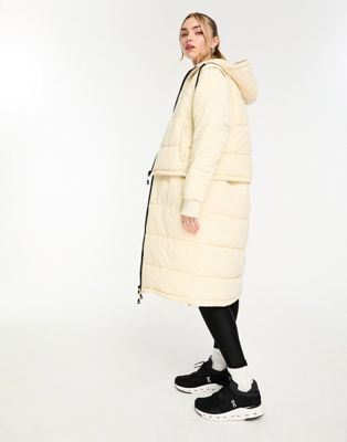 Ellesse Zanibellato longline puffer coat in off white