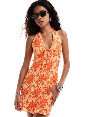 halter neck tropical floral detail mini dress in orange