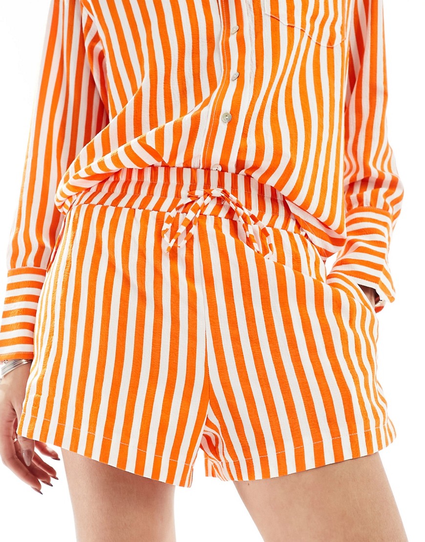 relaxed shorts in white and orange stripe - part of a set