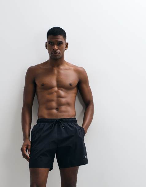 Emporio Armani Bodywear logo swim shorts in black - view 1