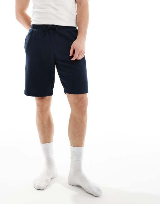 Emporio Armani Bodywear Lounge Shorts in Marineblau mit Logoband ASOS