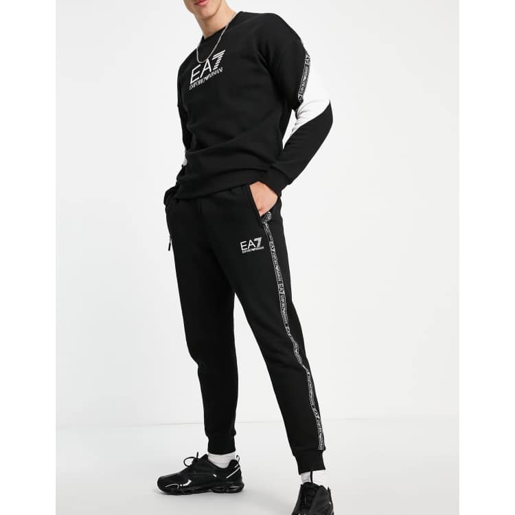 Emporio Armani EA7 Train athletic tape fleece sweatpants in black | ASOS