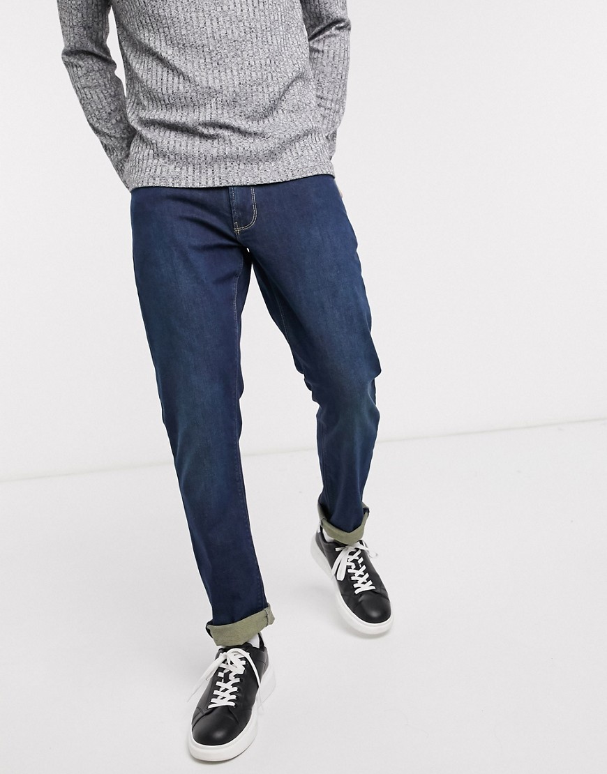 Emporio Armani J06 – Mellanblå slim jeans